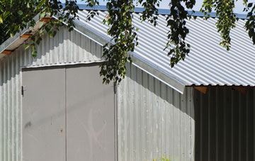 repairing Okus metal garage roofing